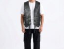 Men's black leather biker vest featuring decorative silver conchos and adjustable side lacing for a custom fit.