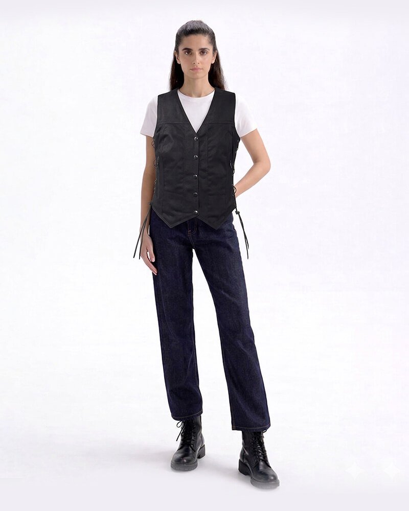 Women's black denim motorcycle vest with black leather side laces, zipper front pockets, and a solid back.